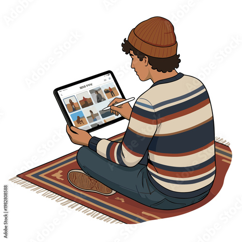 Man sitting on rug uses laptop and stylus indoors