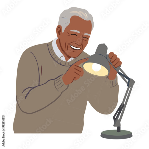 Senior man examining a desk lamp with curiosity indoors