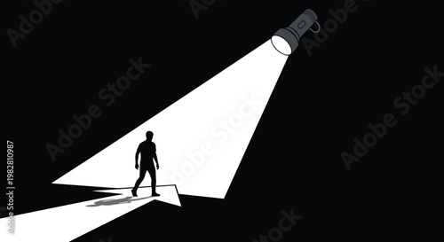 Silhouette of a person walks along a bright white arrow path created by a giant flashlight in a dark and mysterious environment.