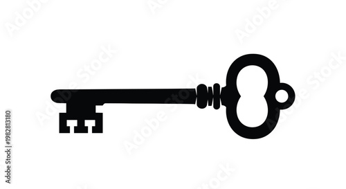 Black silhouette of a vintage ornate skeleton key isolated on a plain white background representing secrets and successful access.