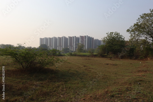 Photography Buildings grow on agriculutre and forest around Hyderabad in India