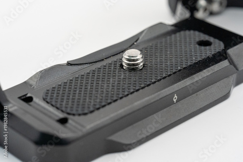 Close-up of camera tripod quick release plate