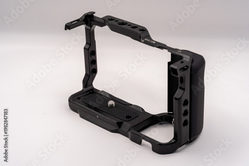Black camera cage frame on white background