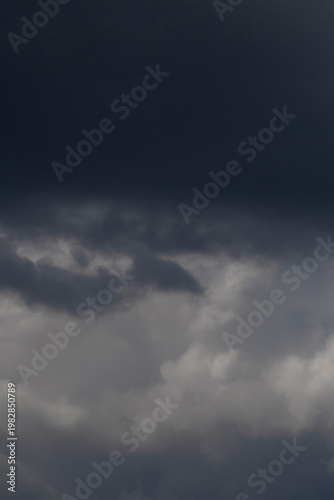 view on dark thunderstorm clouds in a sky