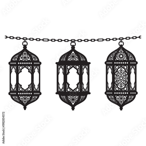 Three Black Metal Lanterns Hanging.