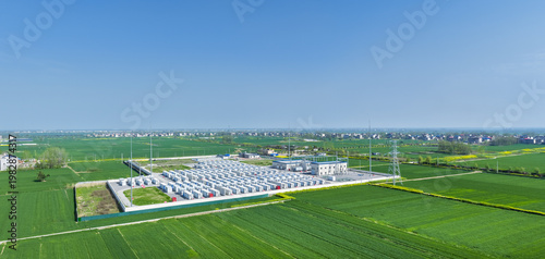 Wallpaper Mural Aerial View of a Large-Scale Battery Energy Storage Plant Surrounded by Spring Wheat Fields Torontodigital.ca