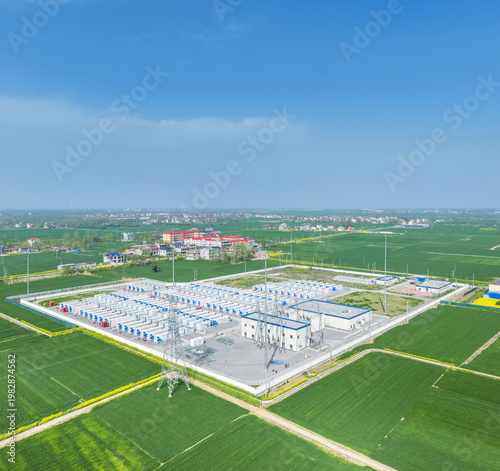 Wallpaper Mural High-Angle Drone Shot of a Large-Scale Battery Energy Storage Facility in Spring Agricultural Region Torontodigital.ca