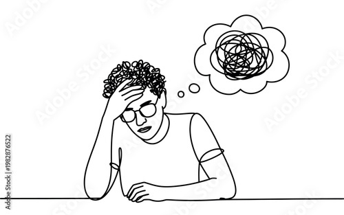 A frustrated man with curly hair and glasses sits at a table with a confused thought bubble