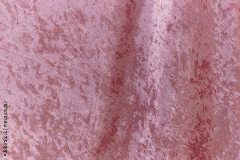 Fototapeta premium Beautiful crushed velvet fabric in a soft pink color.