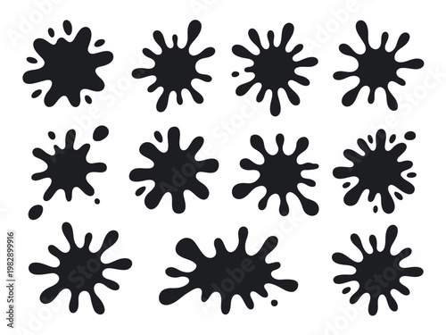 A collection of black ink splatters on a clean white background for design