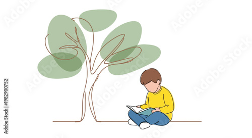 Boy sitting cross legged outdoors reading.