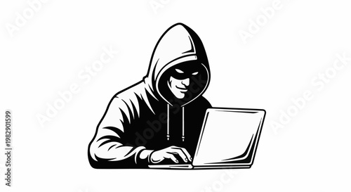 Mysterious figure in a hooded sweatshirt typing on a laptop with intent