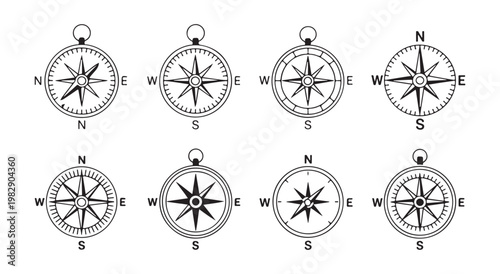 Eight compass illustrations with cardinal points and directional markers for navigation travel and exploration themes.