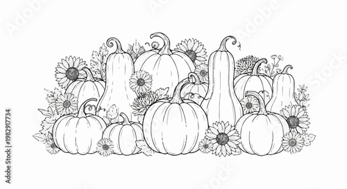 Variety of pumpkins and sunflowers in a fall harvest arrangement