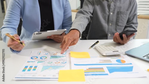 Business team present. professional investor working new start up project. Finance managers meeting.using smart phone and laptop and digital tablet computer in modern office.