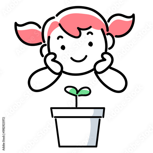 植物の芽を見つめる女の子