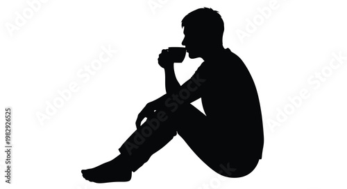 Silhouette of a person sitting and holding a cup appearing contemplative