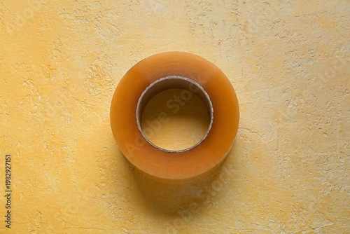 Adhesive tape roll on yello...