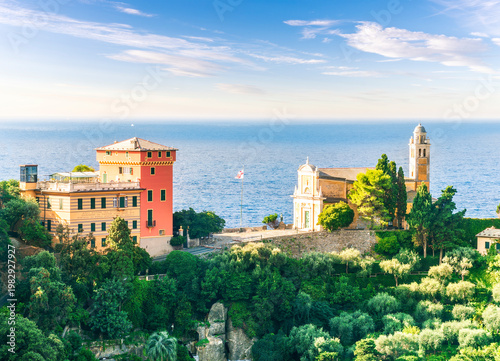 beautiful landscape of luxury resort Portofino in Luguria , Italy.  Sea coast of elite italian resort during sunset or sunrise. Beautiful bay with buildings and green mountain forest.