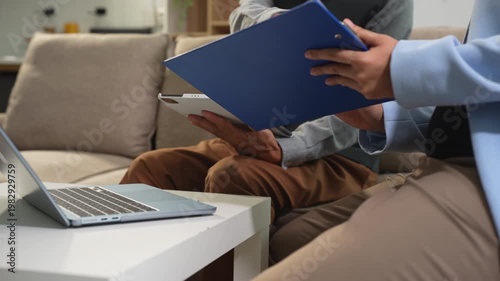 Business team working on a project in the office or reviewing and discussing a business project.