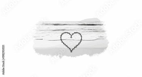 Heart shape drawn in sand by the sea with distant hills
