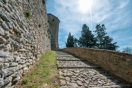 Italy, 10 April 2026: Medieval village Montebello with Azzurrina castle on hilltop, Valmarecchia landscape Rimini Emilia Romagna, historic borgo architecture, scenic view