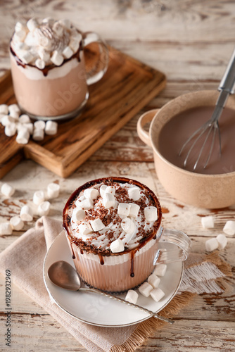 Glass cups of hot cocoa dri...