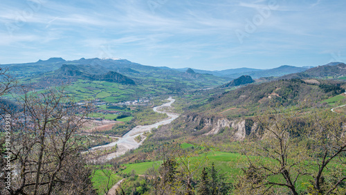 Italy, 10 April 2026: Panoramic view of Val Marecchia with Marecchia River and medieval hilltop villages, Emilia Romagna Rimini landscape, scenic countryside valley view