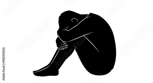 Silhouette of a person curled up in a ball, representing sadness, loneliness, or despair.