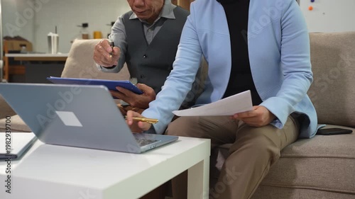 Professionals met in conference room engaged in business-related discussion, Strategizing, problem solutions search.