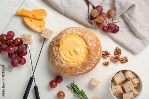 Cheese fondue in bread with...