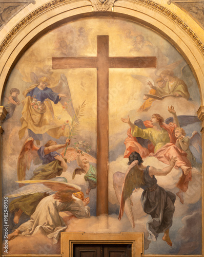 MONZA, ITALY - MARCH 19, 2026:  The fresco of angels adorated the Holy Cross ...
