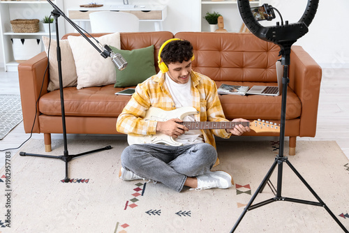 Male blogger in headphones ...