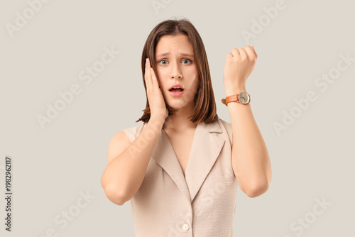 Beautiful young shocked wom...