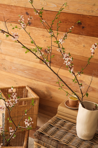 Wicker boxes and vase with ...