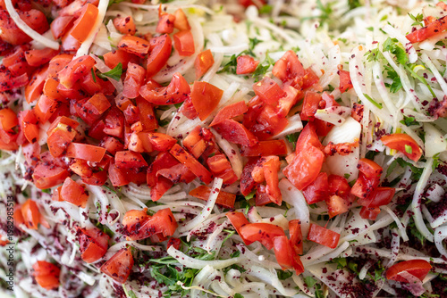 Fresh Mixed Salad with Chopped Tomatoes and Herbs Close-Up