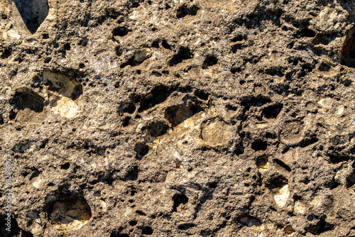 Valokuva Porous volcanic tuff rock texture vesicles cavities pyroclastic structure geolog
