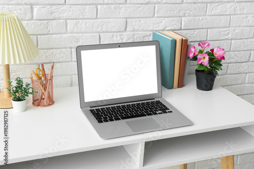Stylish workplace with mode...