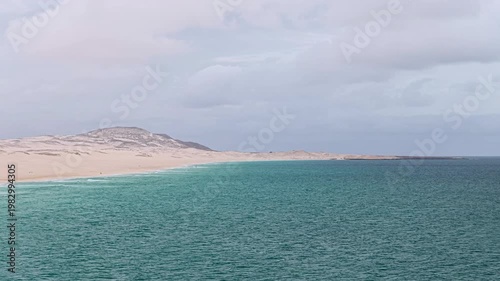 Nice Morro de Areia Natural Reserve is a place of extraordinary beauty and ecological significance,blue ocean,sandy beach,desert dunes and luxury resort,Boa Vista,Cape Verde.