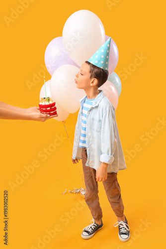 Cute little boy with balloo...