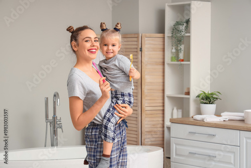 Young mother and her little...