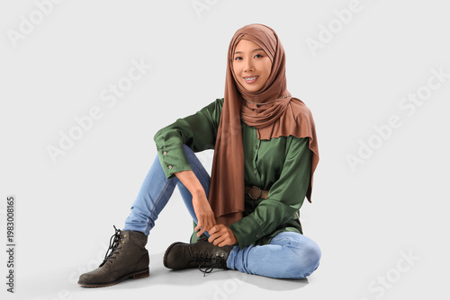 Beautiful young Asian woman...