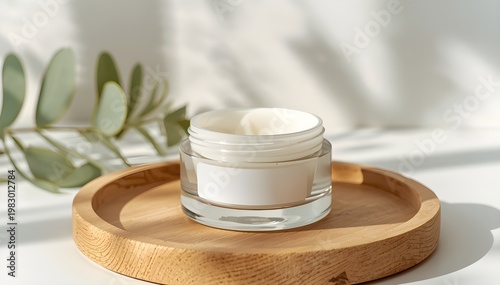 Face cream round container display with botanical shadow and plain white sticker on the front