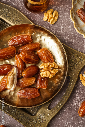 Plate with dried dates and ...