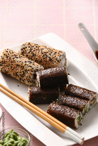 Plate with delicious sushi ...