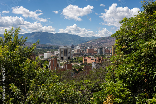 Medellin City Skyline With Mountains And Blue Sky
