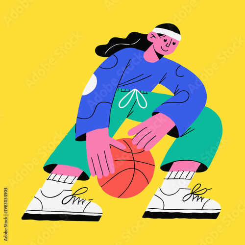 Woman playing basketball with ball while crouching on yellow background  