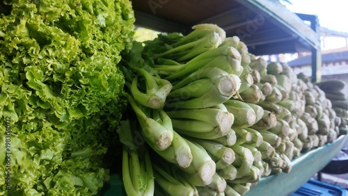 Photo of fresh green vegetables at a market