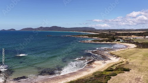 Scenic coast of Tasmania North at Edgcumbe beach by Bass highway – aerial view.