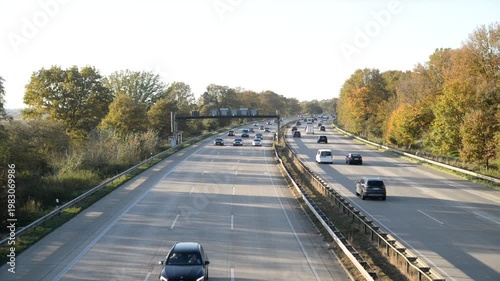 cars moving on the highway Sunny autumn day, view from above on the highway, side light, ‎November 3, 2024, Autobahn A 1 Germany 